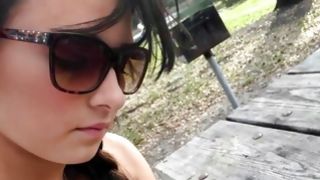 Horny young slut Mandy Sky playing with pecker outdoors