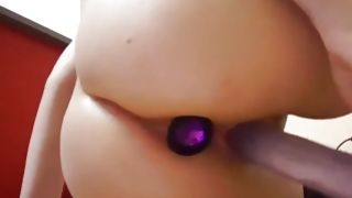 Teen babe fucking her anus with a huge dildo