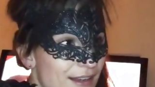 Cute whore in a black mask blowing a huge dick