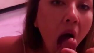 Teen hottie blowing a huge and tasty cock licking it all over