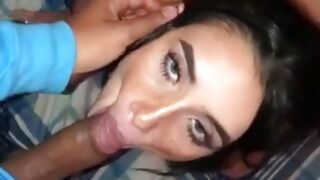 Teen brunette swallowing a massive dick